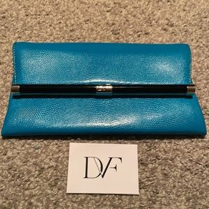 DVF teal emvbossed envelope clutch EUC!!
